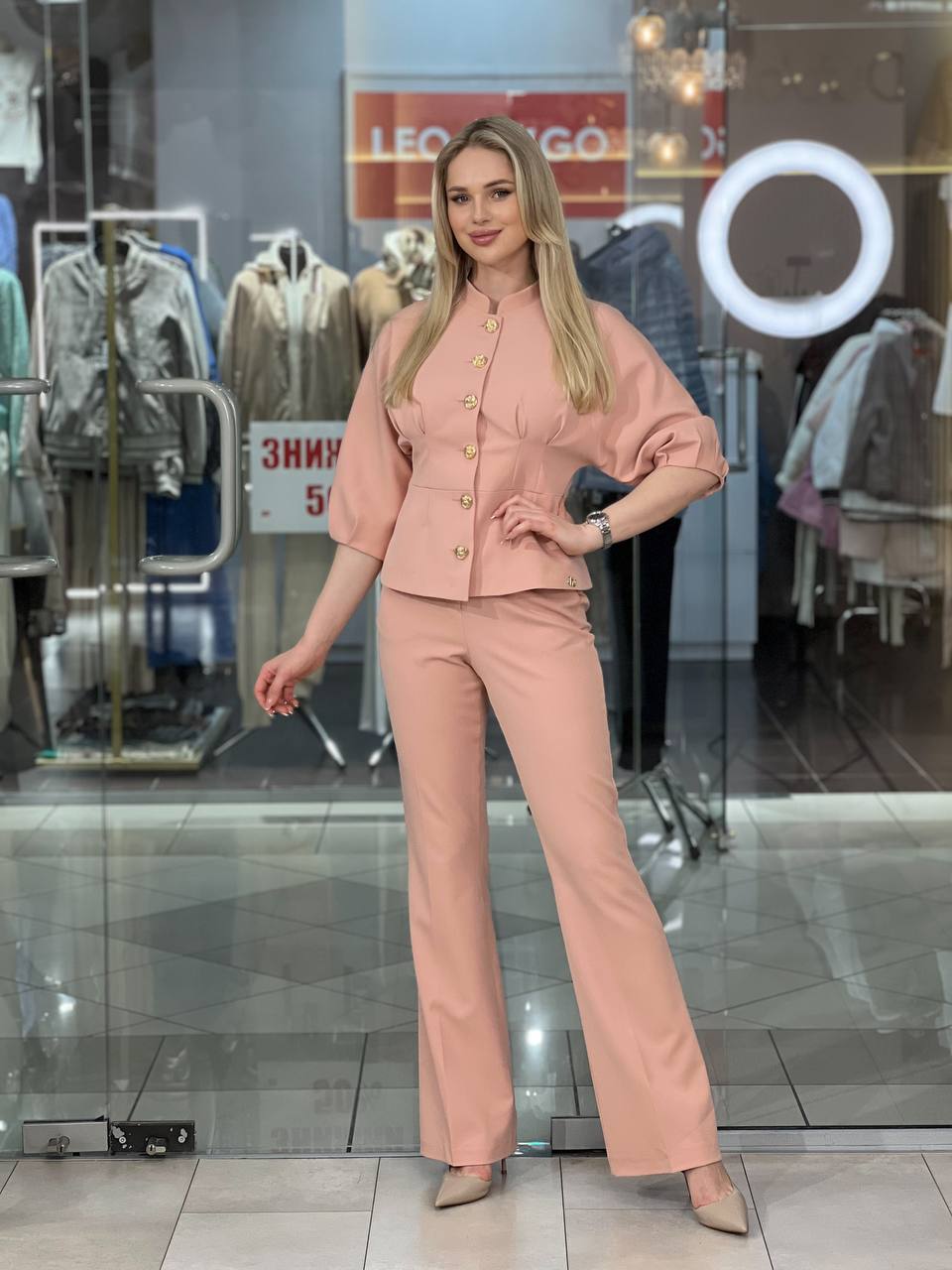 Tailored suit with gold buttons