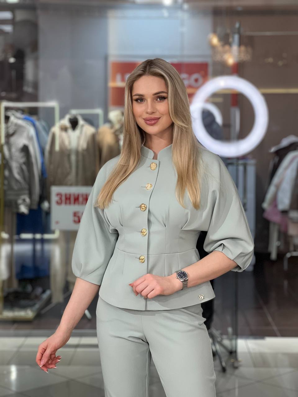 Tailored suit with gold buttons