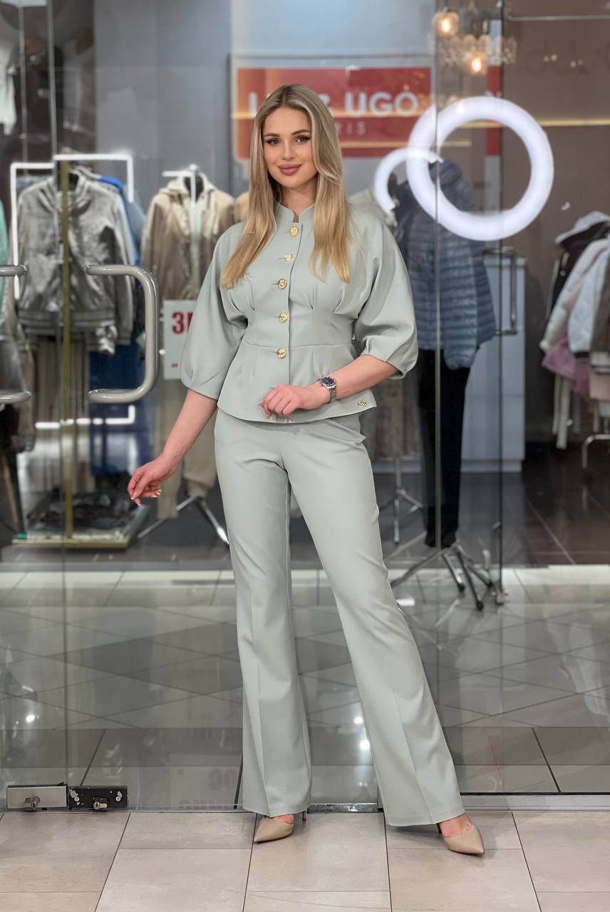 Tailored suit with gold buttons