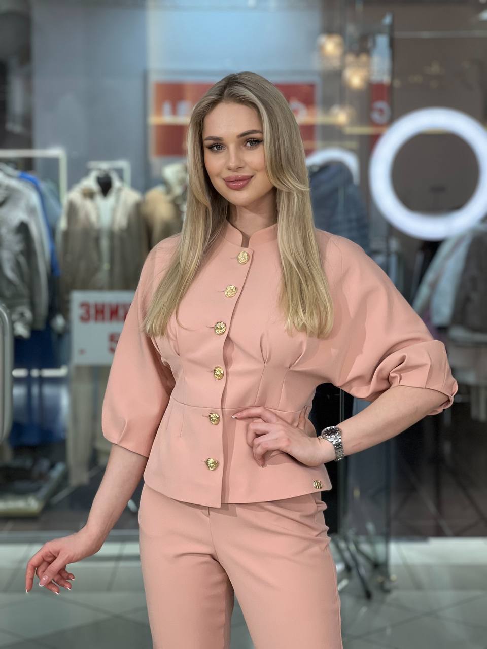 Tailored suit with gold buttons