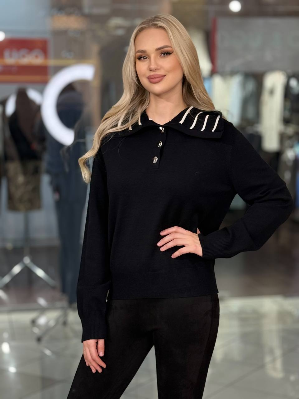 Suéter con detalles dorados